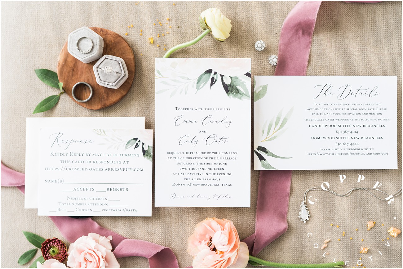 wedding day details invitations with florals and jewelry